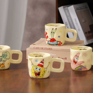 TAZA CERAMICA AMARILLO ESPONJA Y ESTRLLA