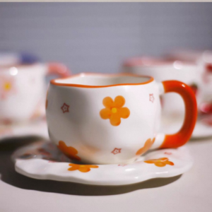 TAZA CERAMICA CON PLATO CON FLORES NARANJA